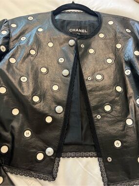 CHANEL Black Leather Jacket with Cream Polka-Dot Details